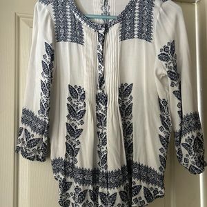 Women’s button up blouse. Flowy and fun.